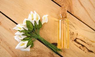 Bottle of Essential Oil and How Room Size Affect Scents.