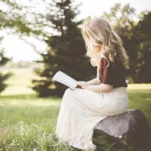 Woman Reading Her Favorite Inquisitive Enthusiast Articles.