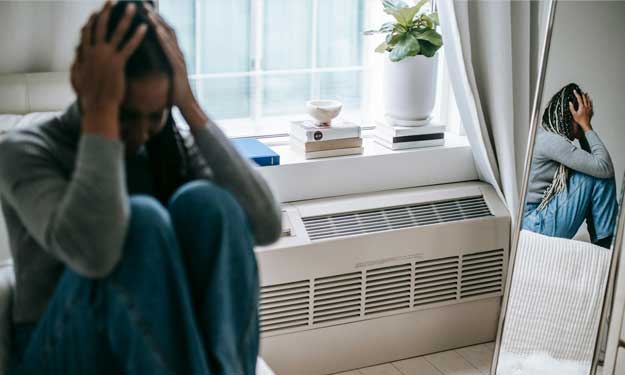 Woman with Migraine. Learn About Silent and Painful Migraines.